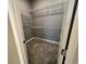 Walk-in closet featuring carpet flooring and white wire shelving for storage and organization at 4535 Gliding Wave St, Winter Garden, FL 34787