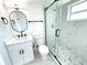 Updated bathroom with walk in shower, modern vanity, and stylish mirror at 4732 Lighthouse Cir, Orlando, FL 32808