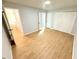 Spacious bedroom with wood-look flooring and large closet at 4732 Lighthouse Cir, Orlando, FL 32808