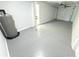 Garage features new epoxy flooring and extra storage space at 4732 Lighthouse Cir, Orlando, FL 32808
