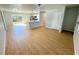Bright and airy living area with hardwood floors and access to backyard at 4732 Lighthouse Cir, Orlando, FL 32808