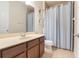 Bathroom with shower/tub combo, toilet and vanity at 4838 Southlawn Ave, Orlando, FL 32811