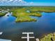 Stunning aerial view of waterfront property and lush landscape at 5 Riverwalk Dr # 503, New Smyrna Beach, FL 32169