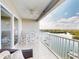 Enjoy water views from this spacious balcony with seating at 5 Riverwalk Dr # 503, New Smyrna Beach, FL 32169
