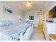 Main bedroom with king bed, private bath access, and water views at 5 Riverwalk Dr # 503, New Smyrna Beach, FL 32169