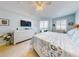 Main bedroom with king bed, dresser, and balcony access at 5 Riverwalk Dr # 503, New Smyrna Beach, FL 32169