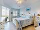 Spacious main bedroom with water views and king-size bed at 5 Riverwalk Dr # 503, New Smyrna Beach, FL 32169