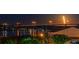 Scenic nighttime view of the waterfront and bridge at 5 Riverwalk Dr # 503, New Smyrna Beach, FL 32169