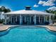 Inviting community pool with adjacent clubhouse at 5 Riverwalk Dr # 503, New Smyrna Beach, FL 32169