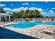 Resort-style pool with lounge chairs and spa at 5 Riverwalk Dr # 503, New Smyrna Beach, FL 32169