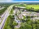 Community view showcasing condo, pool, and tennis court at 5003 Laguna Bay Cir # 16, Kissimmee, FL 34746