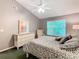 Main bedroom with a dresser, chair, and large bed at 5003 Laguna Bay Cir # 16, Kissimmee, FL 34746