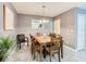 Dining room features a wood table and chairs with a chandelier at 5003 Laguna Bay Cir # 16, Kissimmee, FL 34746