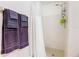 Shower stall with white tile and a white shower curtain at 5003 Laguna Bay Cir # 16, Kissimmee, FL 34746