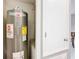 Water heater and utility closet at 5003 Laguna Bay Cir # 16, Kissimmee, FL 34746