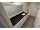 Updated bathroom with granite countertop and tile flooring at 5587 Devonbriar Way # 104, Orlando, FL 32822