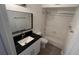 Renovated bathroom with granite countertop and shower/tub at 5587 Devonbriar Way # 104, Orlando, FL 32822