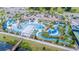 Aerial view showing resort-style pool and community clubhouse at 8857 Rhodes St, Kissimmee, FL 34747