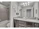 Bathroom with double vanity and granite top at 8857 Rhodes St, Kissimmee, FL 34747