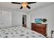 Bedroom with king-size bed and built-in TV at 8857 Rhodes St, Kissimmee, FL 34747