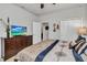 Guest bedroom with a comfortable queen-size bed and TV at 8857 Rhodes St, Kissimmee, FL 34747