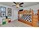 Bedroom with bunk beds and built in drawers at 8857 Rhodes St, Kissimmee, FL 34747