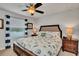 Main bedroom with king-size bed and water view at 8857 Rhodes St, Kissimmee, FL 34747
