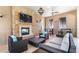 Community room with fireplace and comfortable seating at 8857 Rhodes St, Kissimmee, FL 34747