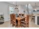 Rustic dining set with a wooden table and chairs at 8857 Rhodes St, Kissimmee, FL 34747