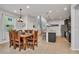 Rustic dining set with a wooden table and chairs at 8857 Rhodes St, Kissimmee, FL 34747