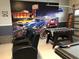 Fun game room, foosball table, and racing mural at 8857 Rhodes St, Kissimmee, FL 34747