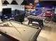 Game room with pool table, foosball, and mural at 8857 Rhodes St, Kissimmee, FL 34747