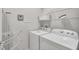 Bright laundry room with washer and dryer at 8857 Rhodes St, Kissimmee, FL 34747