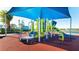 playground with shade structure and modern equipment at 8857 Rhodes St, Kissimmee, FL 34747