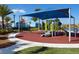 Modern playground with shade canopy for  at 8857 Rhodes St, Kissimmee, FL 34747