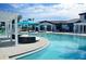 Resort-style pool with lounge chairs at 8857 Rhodes St, Kissimmee, FL 34747