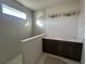 Bathroom with marble shower and double vanity at 9819 Gobat Aly, Orlando, FL 32827