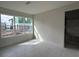 A bedroom showcasing the bright and airy atmosphere, with a large window and closet at 9819 Gobat Aly, Orlando, FL 32827