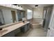 Large bathroom with double vanity and corner tub at 12061 Greco Dr, Orlando, FL 32824
