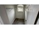 Functional closet with overhead storage and window at 12061 Greco Dr, Orlando, FL 32824