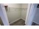 Spacious walk-in closet with wire shelving and wood-look flooring at 12061 Greco Dr, Orlando, FL 32824