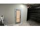 Garage with extra room and mirror door at 12061 Greco Dr, Orlando, FL 32824
