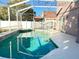 Enjoy this refreshing pool with screened enclosure and lights at 12061 Greco Dr, Orlando, FL 32824