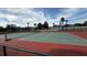 Exterior view of a tennis court at 12061 Greco Dr, Orlando, FL 32824