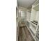 Large walk-in closet with ample shelving and drawers at 12061 Greco Dr, Orlando, FL 32824