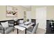 Home office with a desk and comfortable seating at 1300 Cascades Ave, Davenport, FL 33837