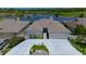 Charming single-story home with a well-manicured front yard and a driveway leading to an attached garage, near lake at 1433 Lake Marion Dr, Apopka, FL 32712