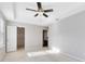 Bright bedroom with ceiling fan and walk-in closet at 1624 Valmont Ln, Apopka, FL 32703