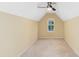Charming bedroom with vaulted ceiling and window at 1624 Valmont Ln, Apopka, FL 32703