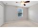 Bright bedroom with carpeted floor and neutral walls at 1624 Valmont Ln, Apopka, FL 32703